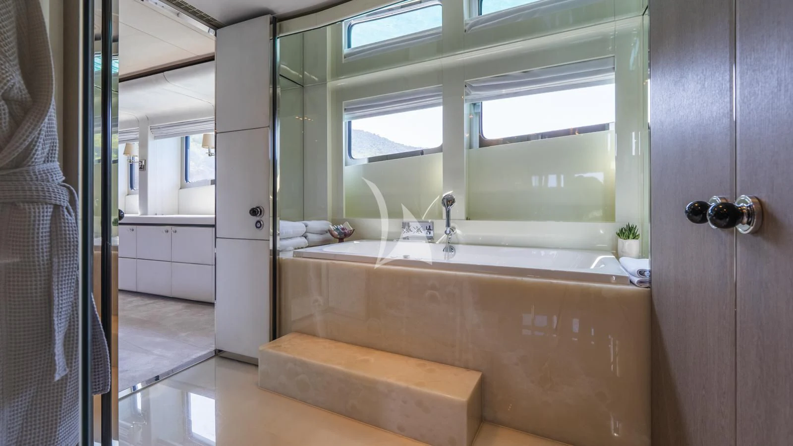 a bathtub in a bathroom aboard BLISS Yacht for Sale
