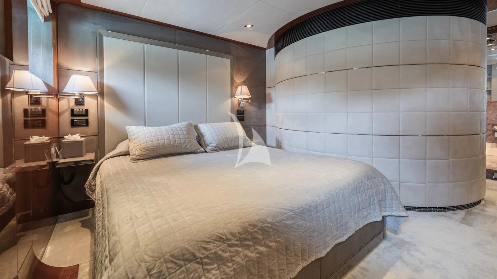 a bed with a white sheet aboard BLISS Yacht for Sale
