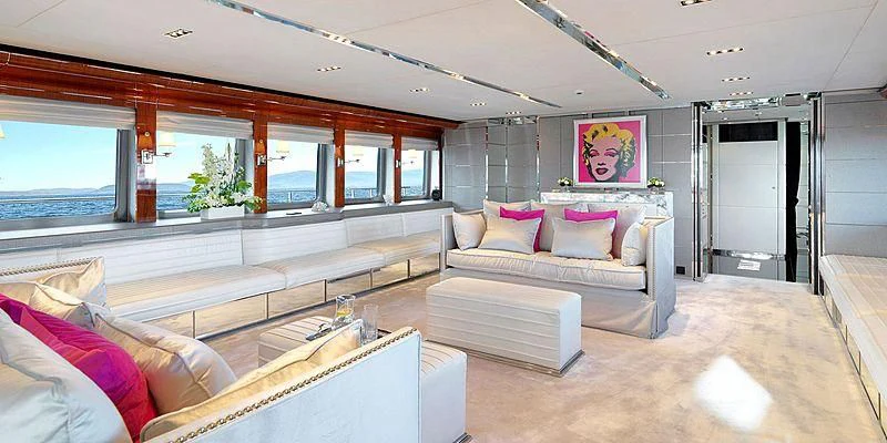 a living room with a large window aboard BLISS Yacht for Sale