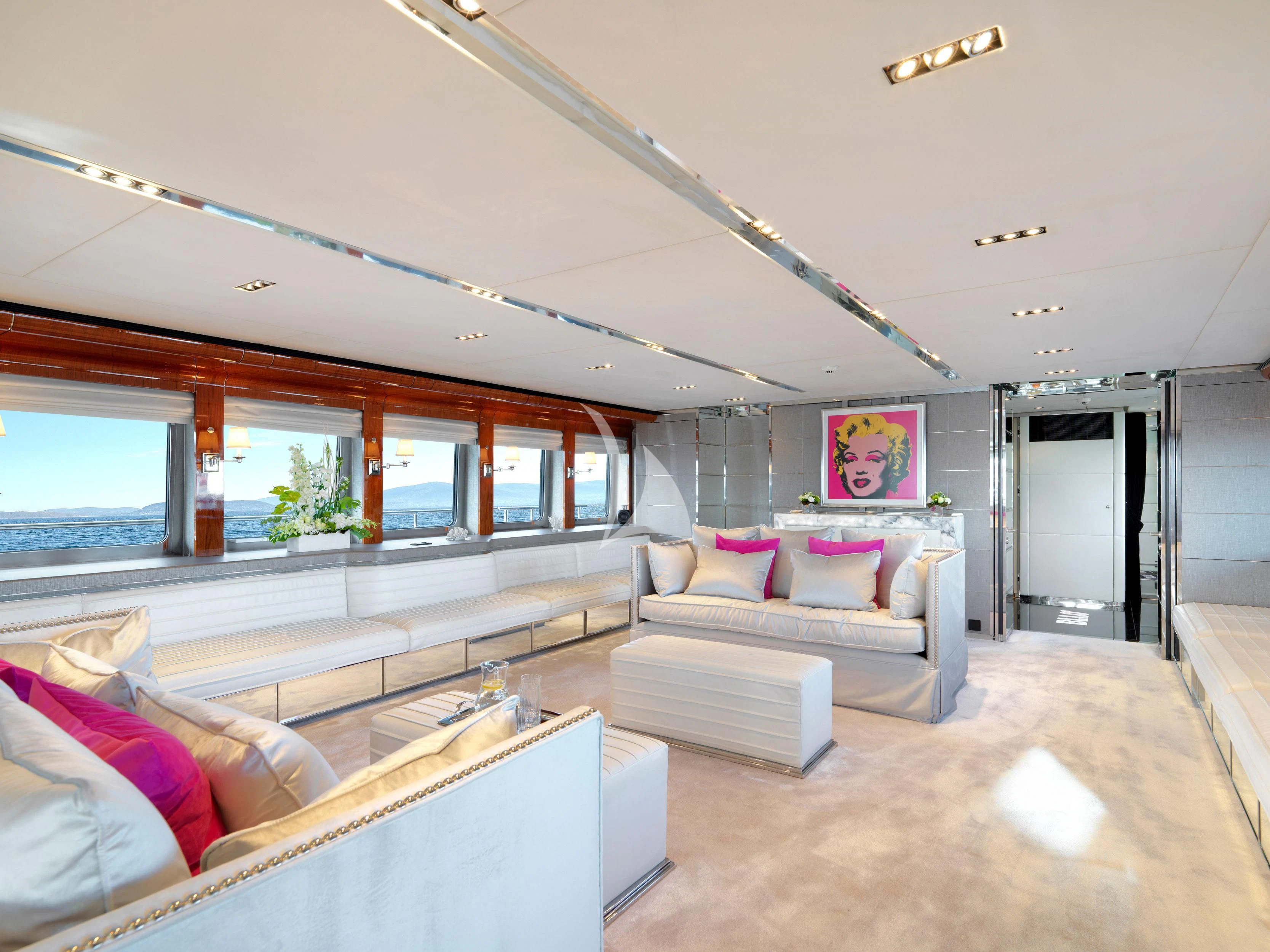 a living room with a large window aboard BLISS Yacht for Sale