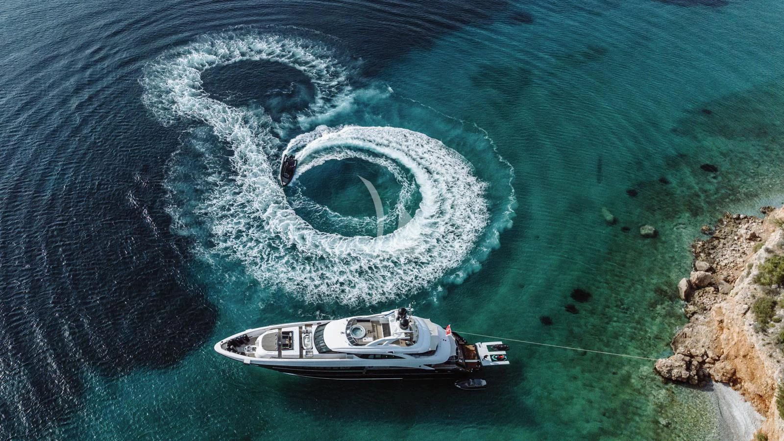 a high angle view of a boat in the water aboard BLISS Yacht for Sale