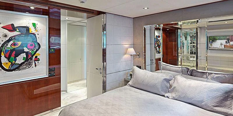 a bed in a room aboard BLISS Yacht for Sale