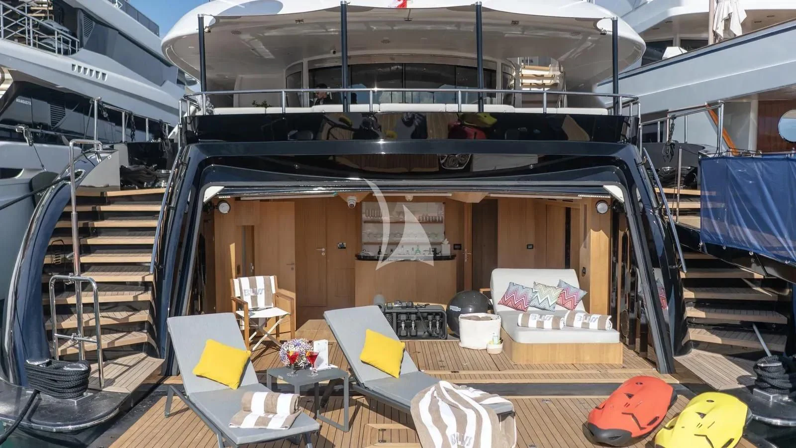 a room with a table and chairs aboard BLISS Yacht for Sale
