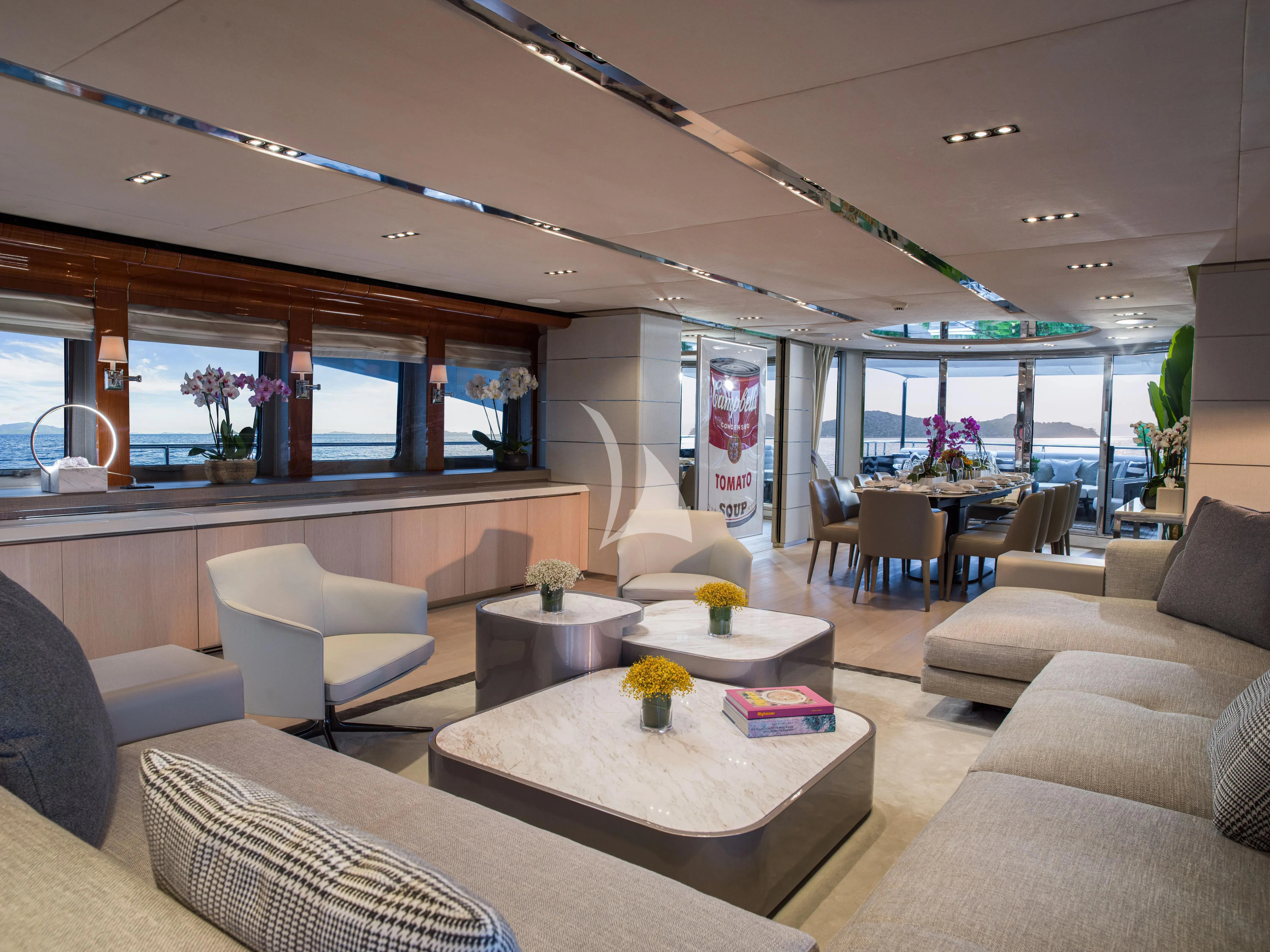 a living room with a large window aboard BLISS Yacht for Sale