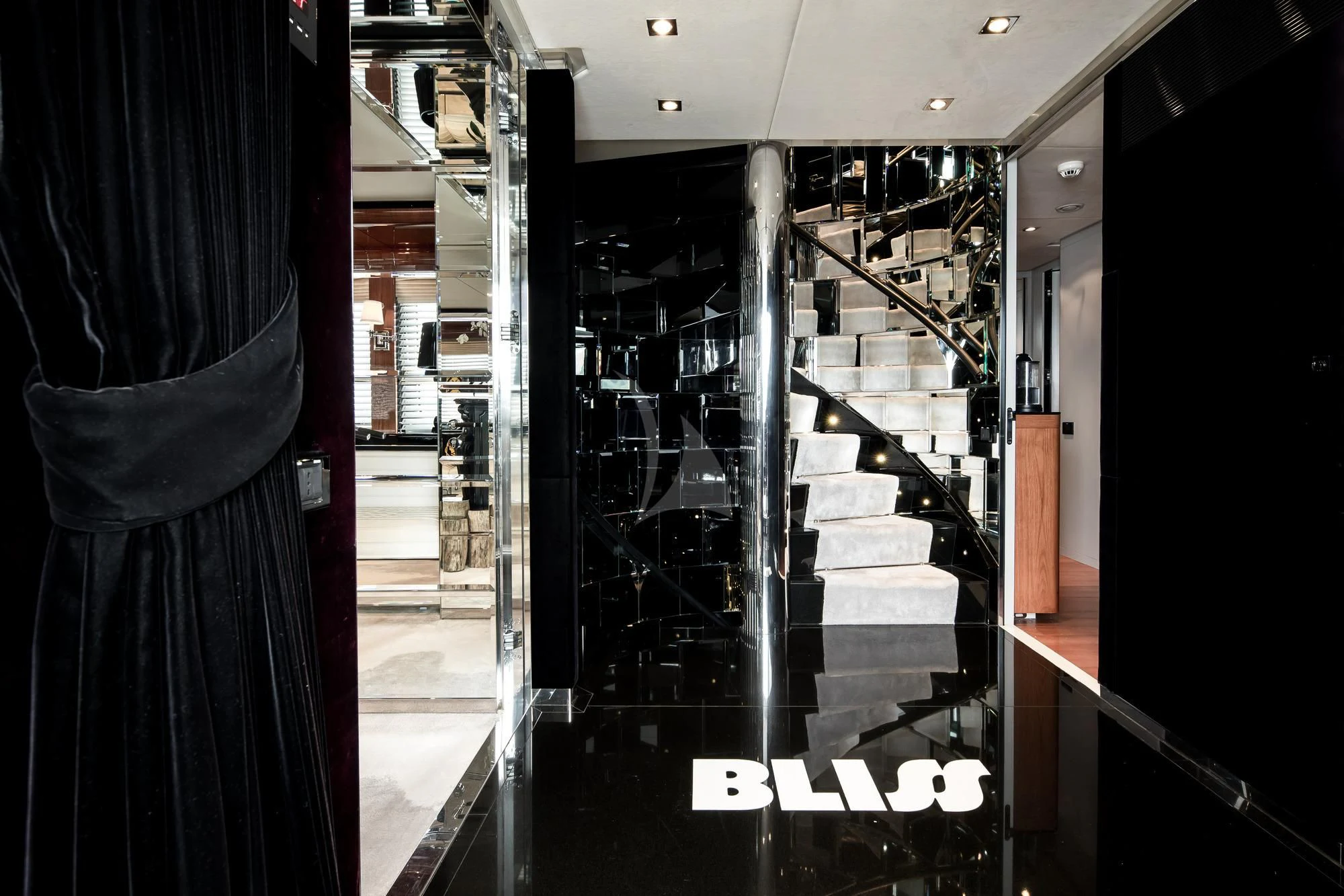 a hallway with a black curtain and a black curtain aboard BLISS Yacht for Sale