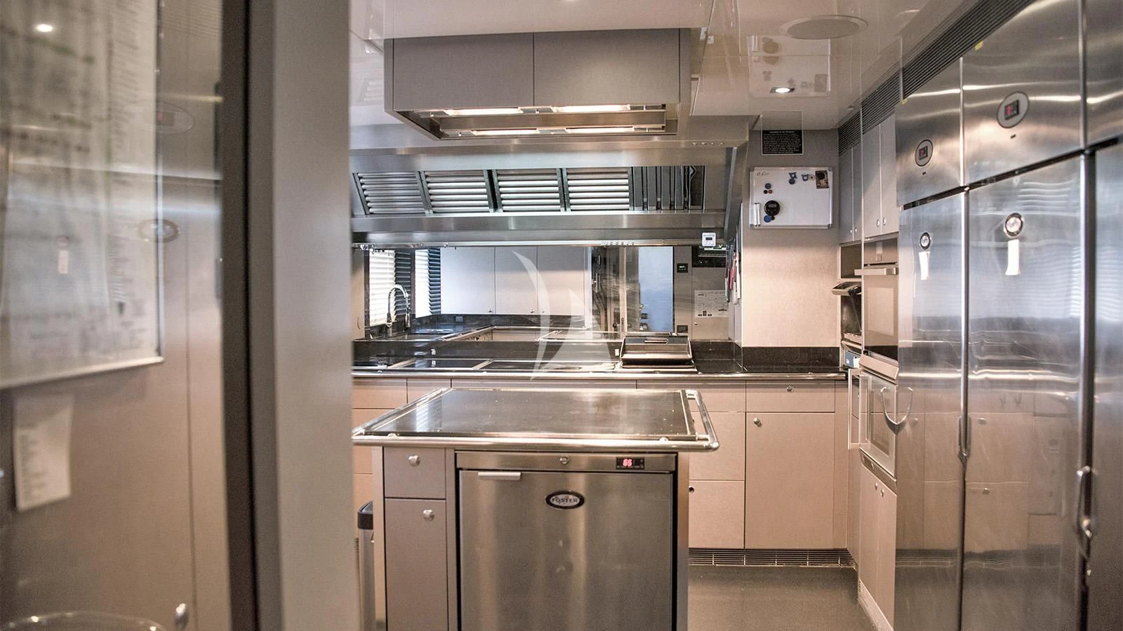 a kitchen with stainless steel appliances aboard BLISS Yacht for Sale