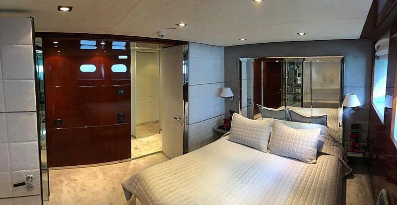 a hotel room with a bed aboard BLISS Yacht for Sale
