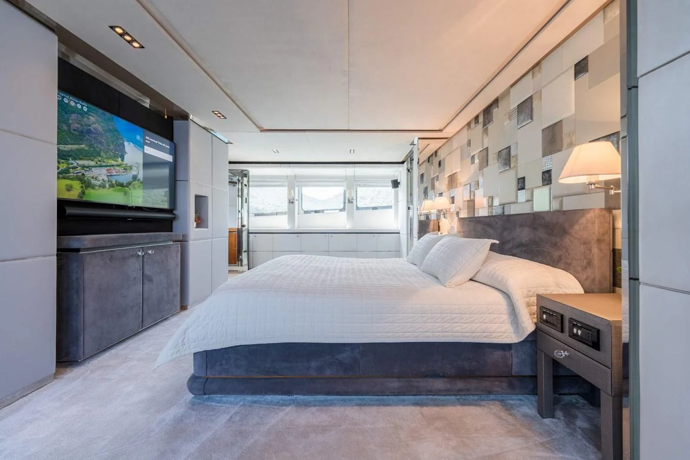 a bed in a room aboard BLISS Yacht for Sale