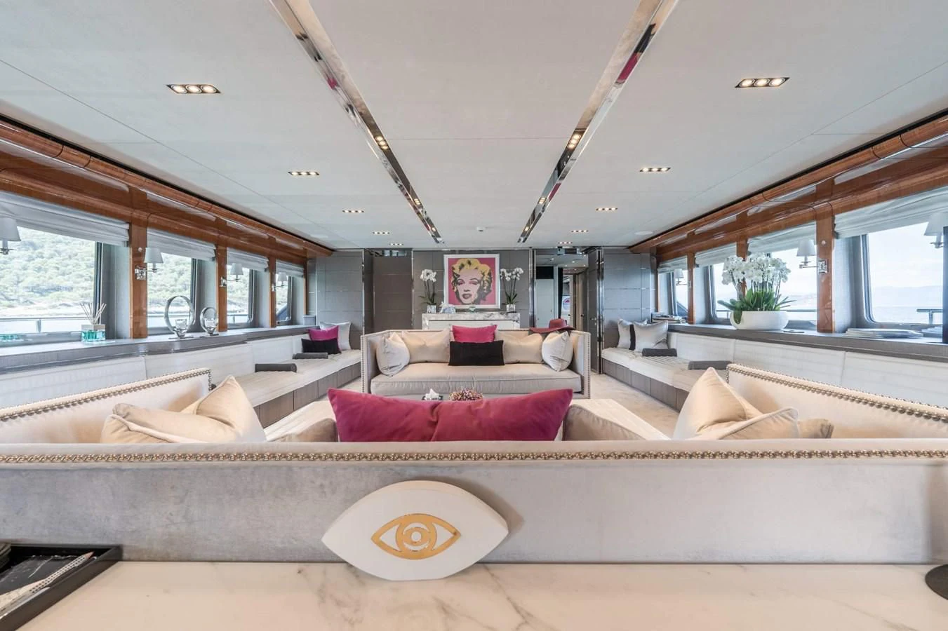 a large living room with a large window aboard BLISS Yacht for Sale