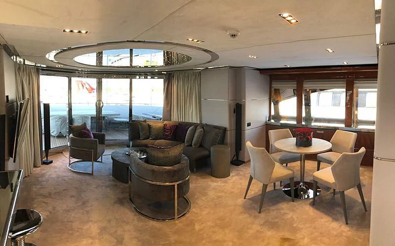a living room with a large glass ceiling aboard BLISS Yacht for Sale