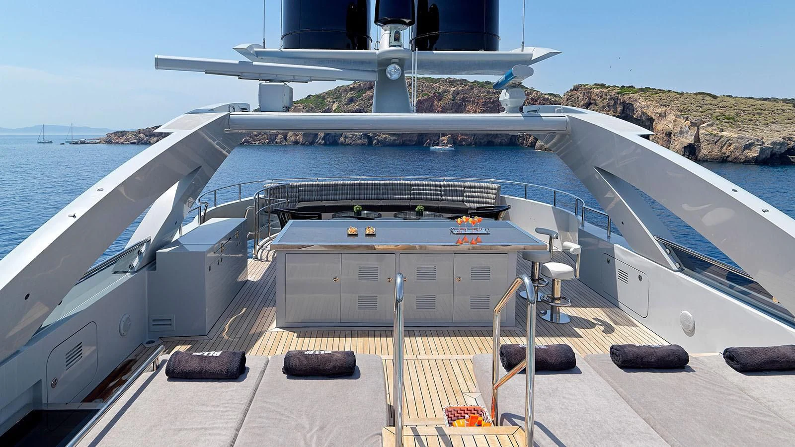 a large ship on the water aboard BLISS Yacht for Sale