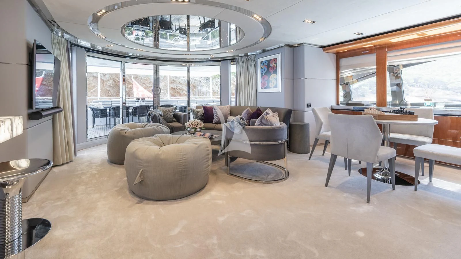a living room with a large window aboard BLISS Yacht for Sale