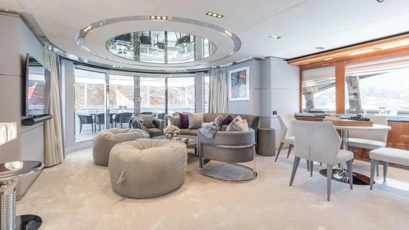 a living room with a large window aboard BLISS Yacht for Sale