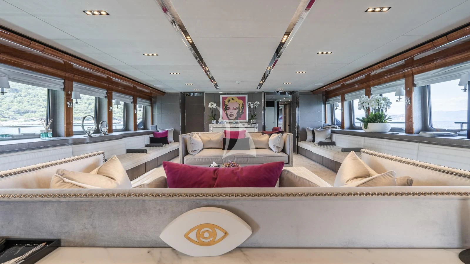 a living room with a large window aboard BLISS Yacht for Sale