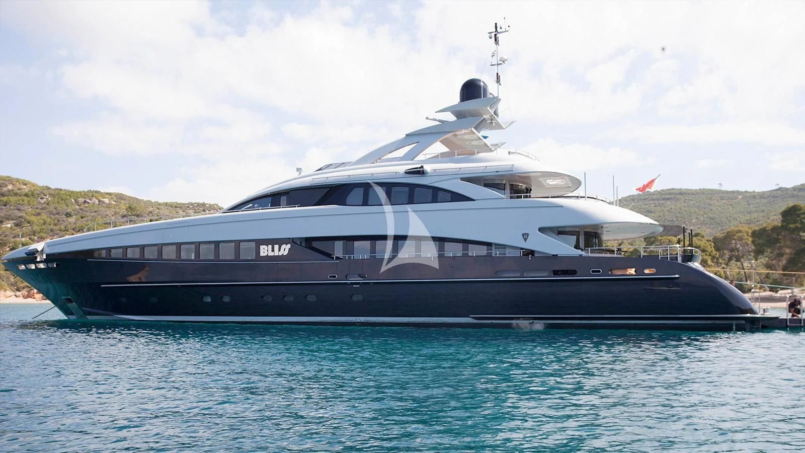 a large boat in the water aboard BLISS Yacht for Sale