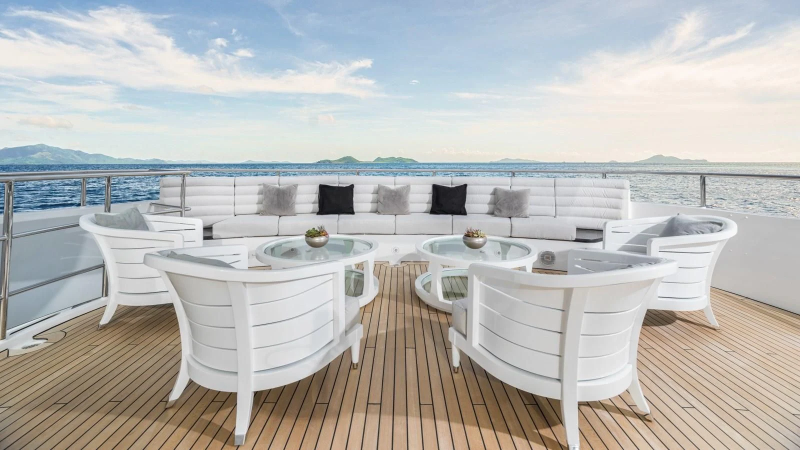 a room with a table and chairs aboard BLISS Yacht for Sale