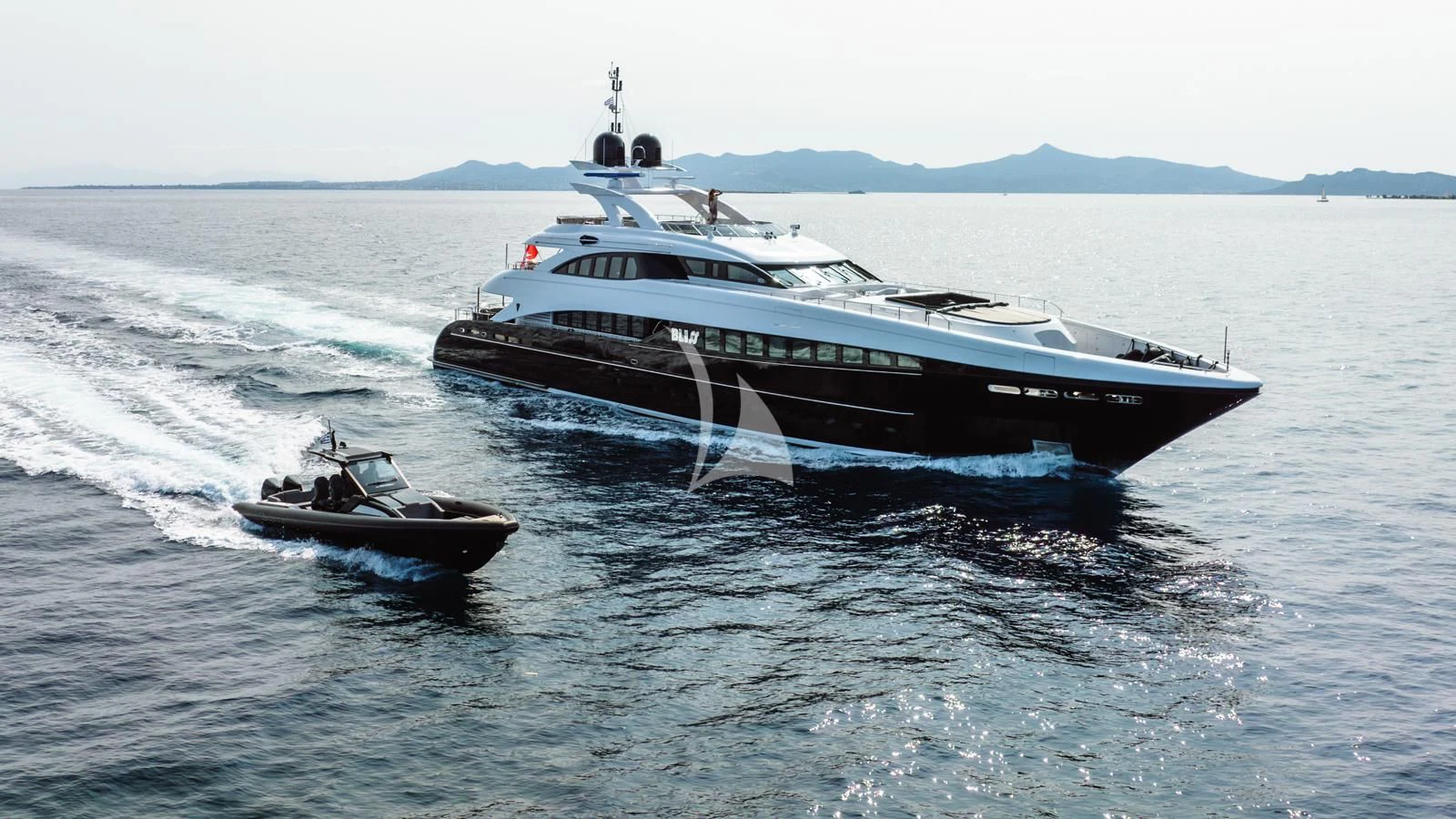 a boat and a boat in the water aboard BLISS Yacht for Sale