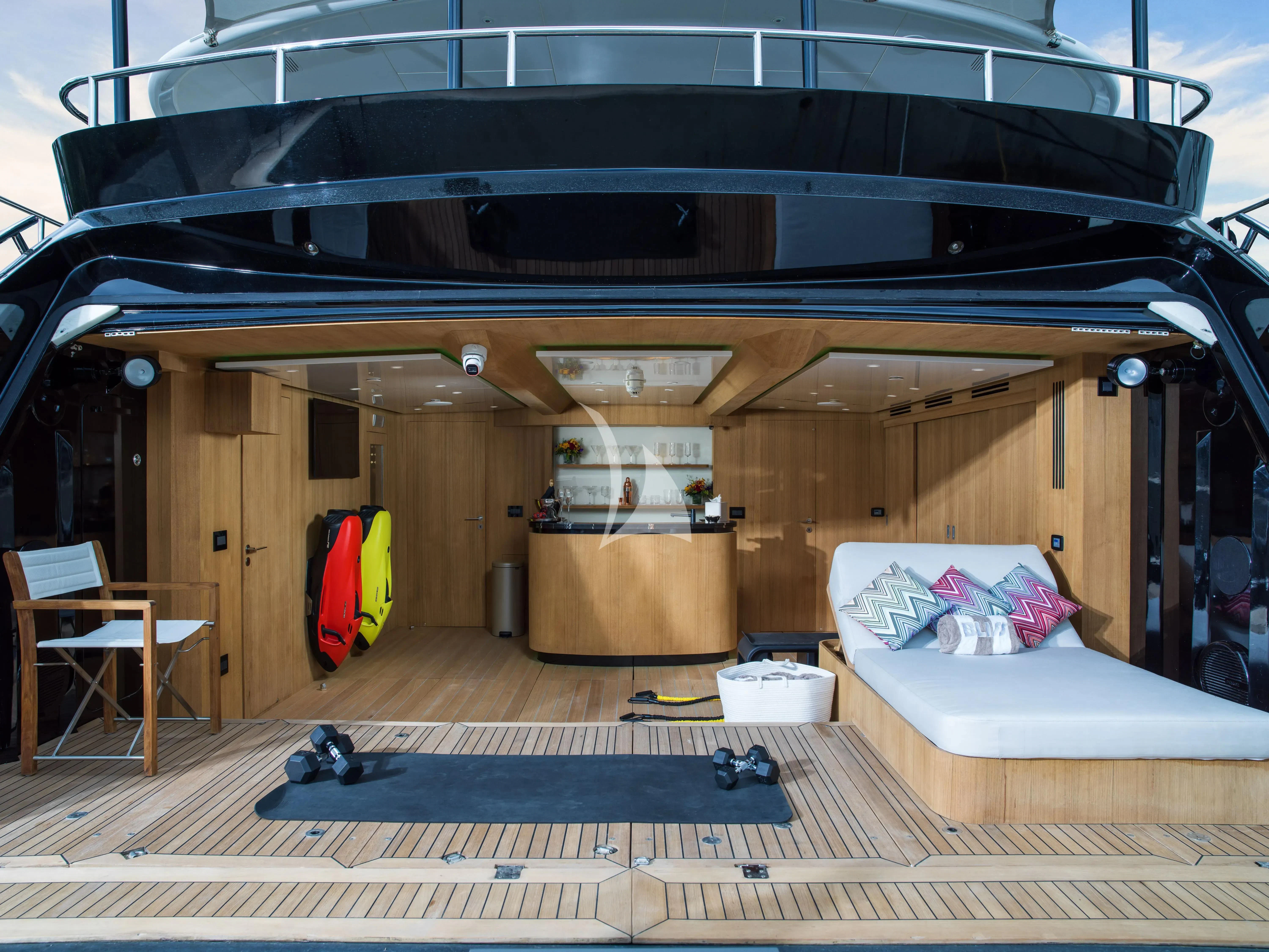 a room with a bed and a couch aboard BLISS Yacht for Sale