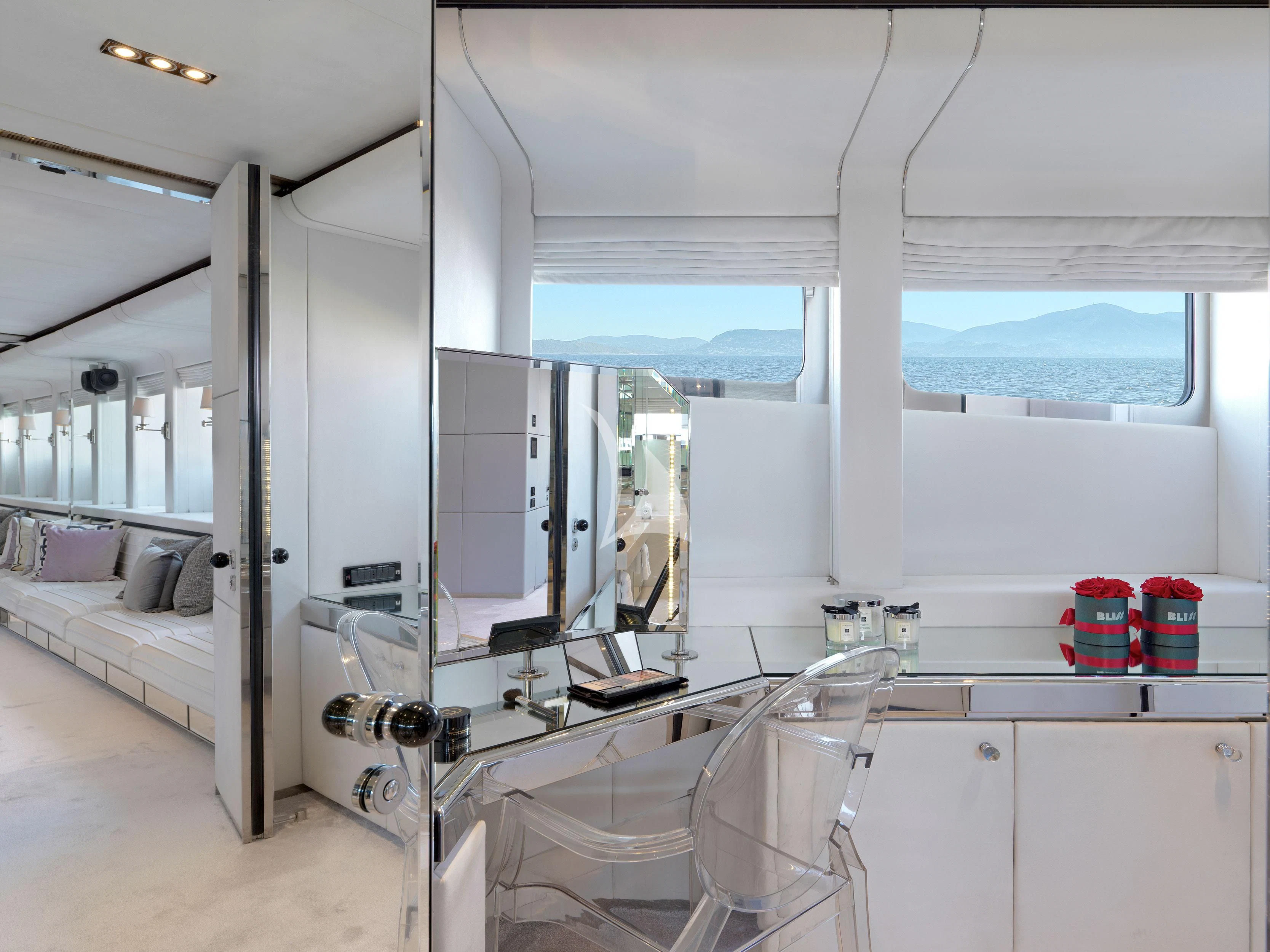 a room with a bed and a desk aboard BLISS Yacht for Sale
