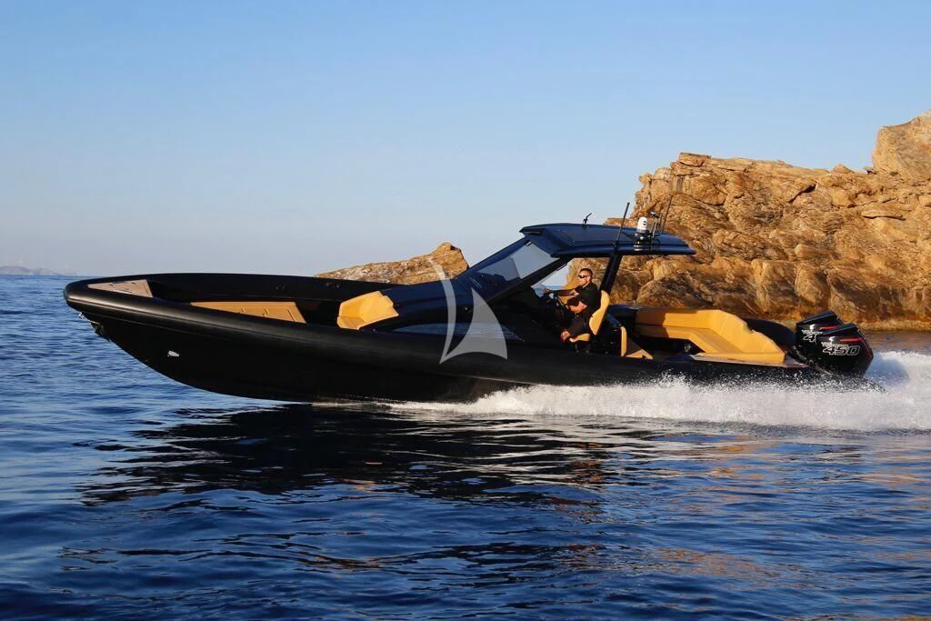 a man and a woman in a yellow kayak on a lake aboard BLISS Yacht for Sale