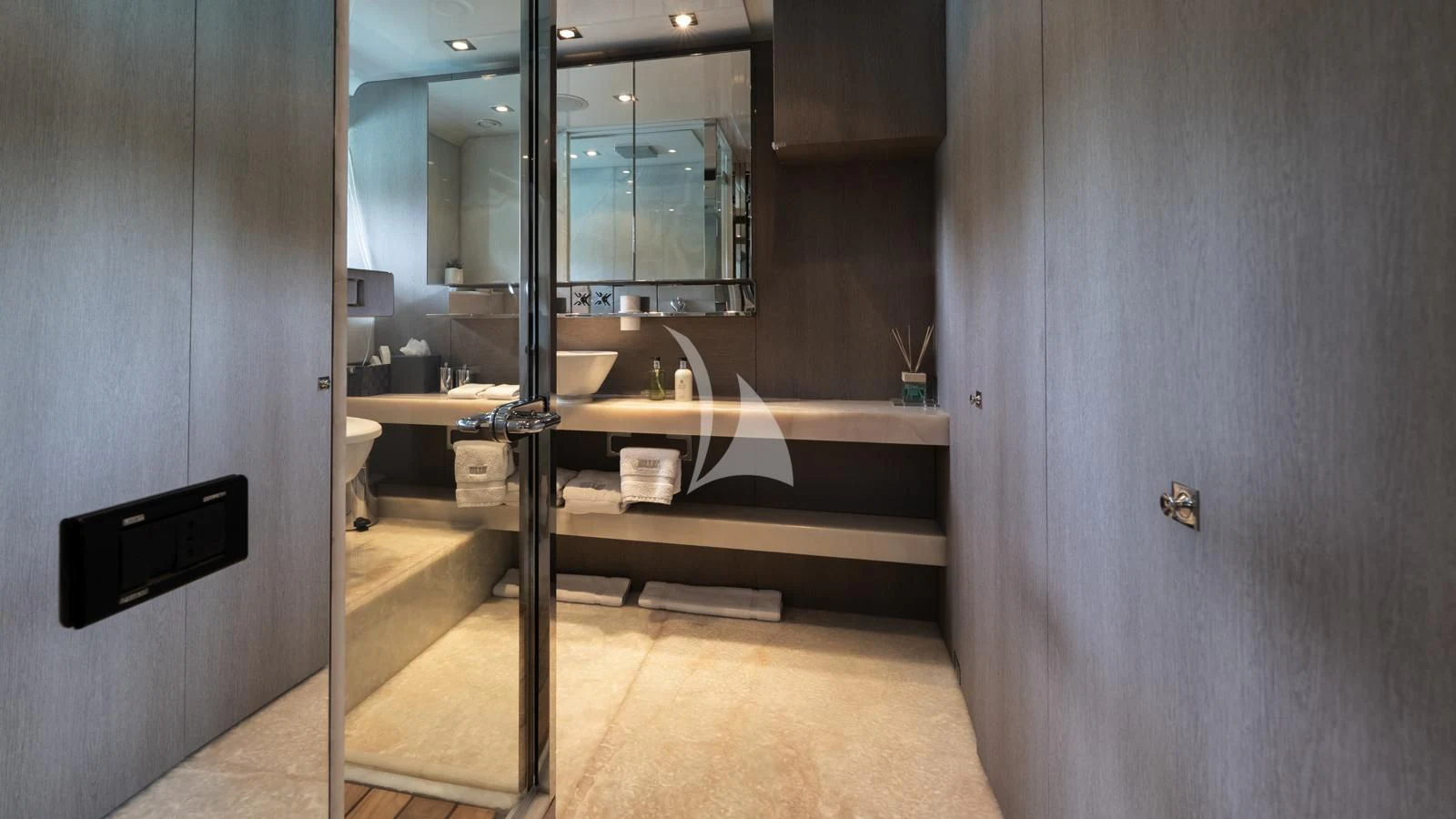 a bathroom with a large mirror aboard BLISS Yacht for Sale