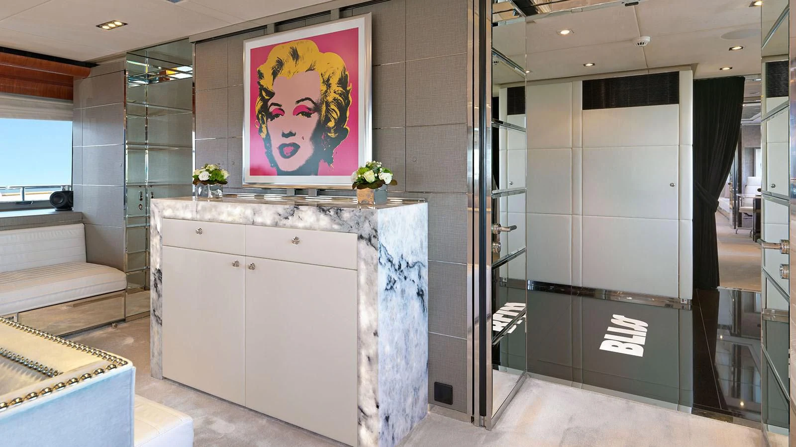 a room with a large display aboard BLISS Yacht for Sale