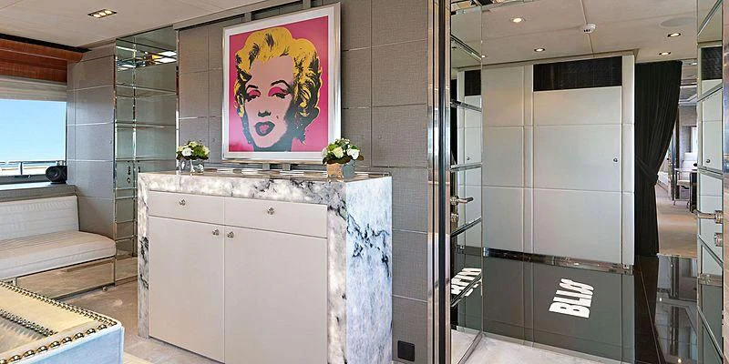 a bathroom with a painting aboard BLISS Yacht for Sale