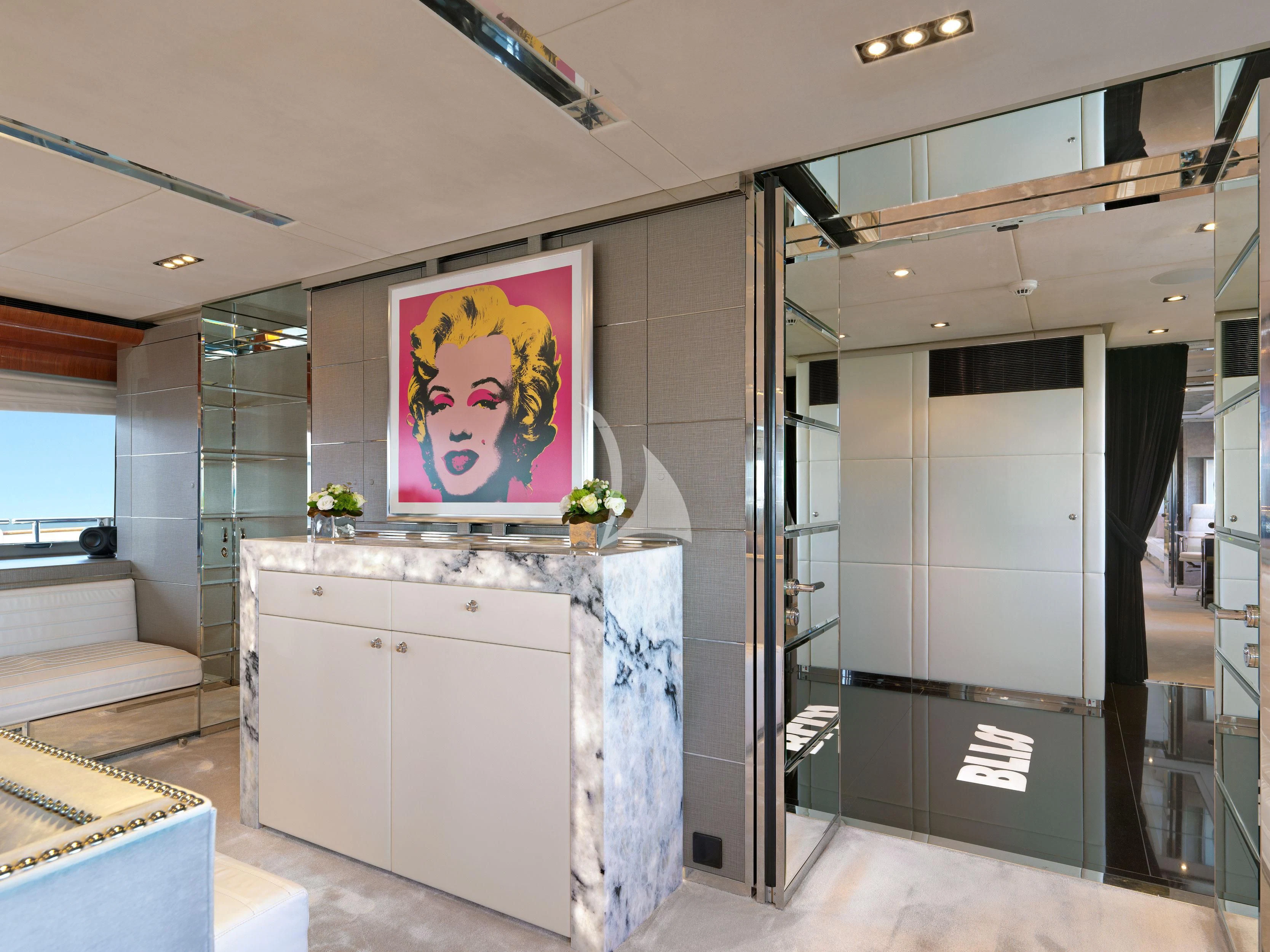 a room with a large display aboard BLISS Yacht for Sale