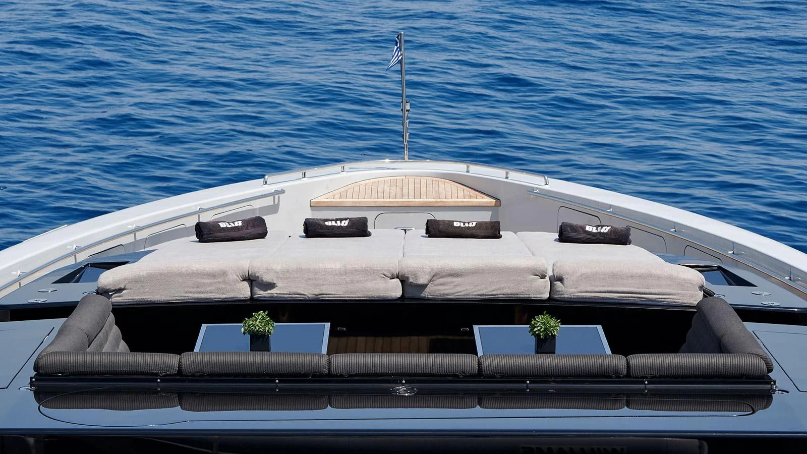 a white boat in the water aboard BLISS Yacht for Sale