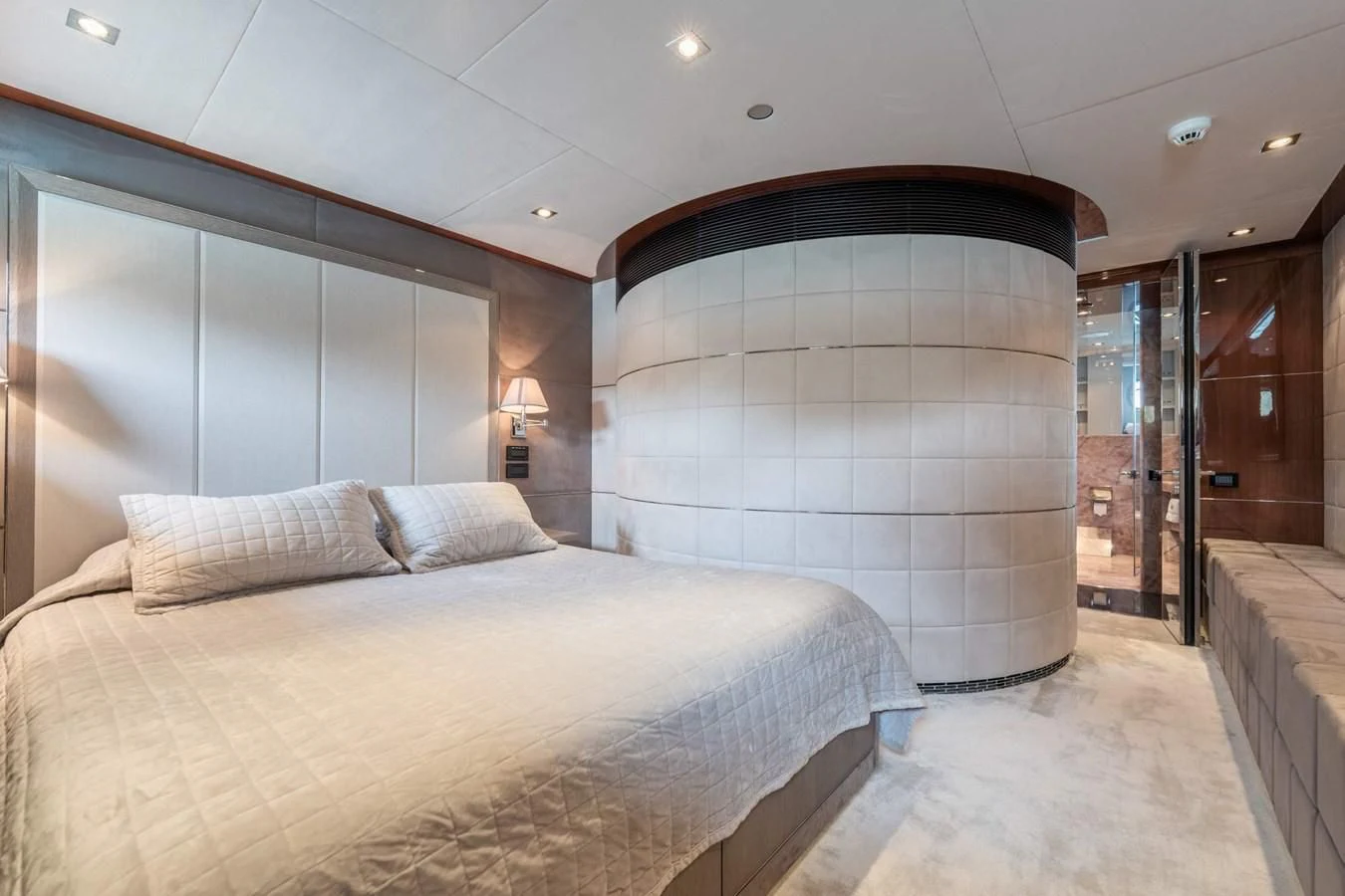 a large bedroom with a large bed aboard BLISS Yacht for Sale