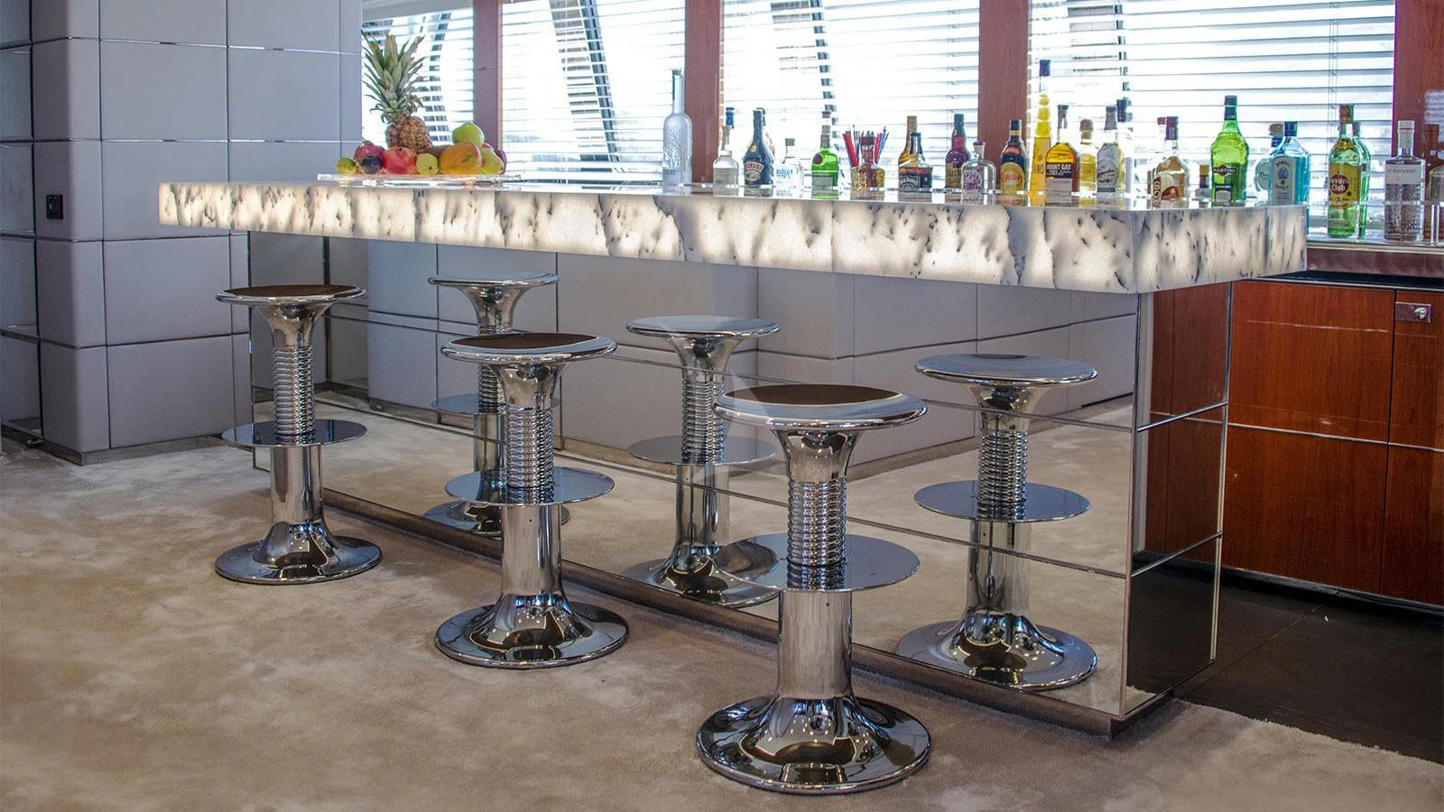 a bar with a bar stool aboard BLISS Yacht for Sale