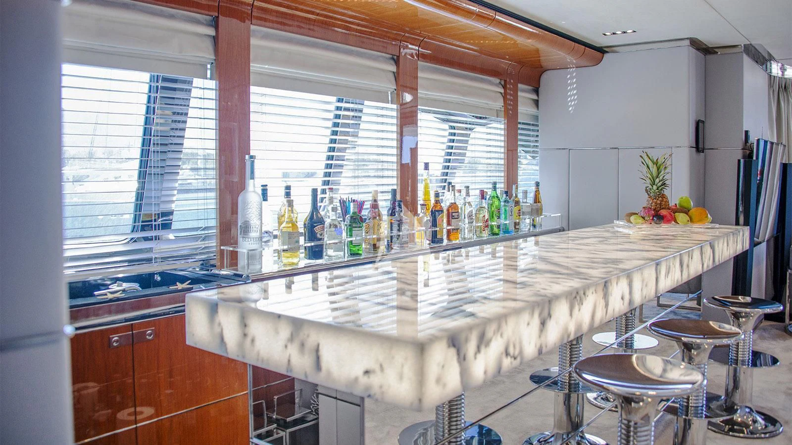 a table with bottles on it aboard BLISS Yacht for Sale