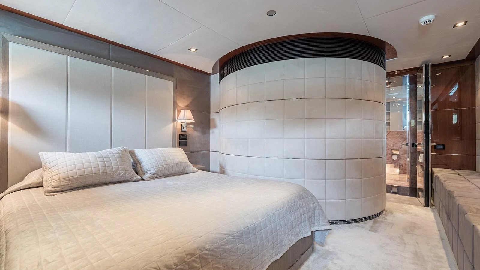 a large bed in a room aboard BLISS Yacht for Sale