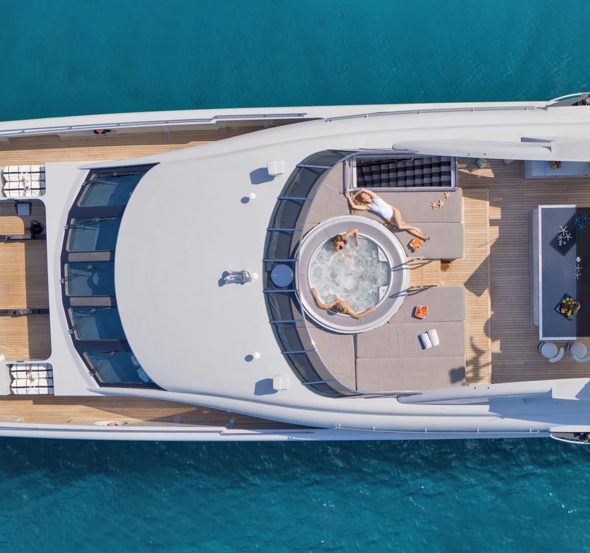 a large ship on the water aboard BLISS Yacht for Sale