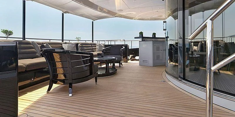 a room with a couch and a table aboard BLISS Yacht for Sale