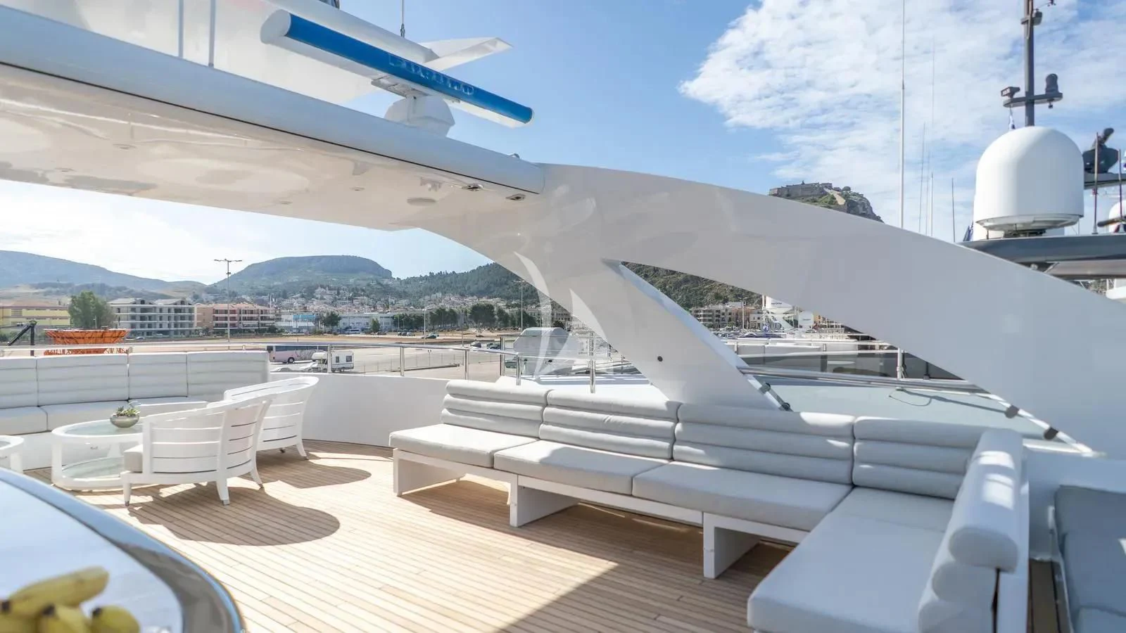 a large white boat on a deck aboard BLISS Yacht for Sale