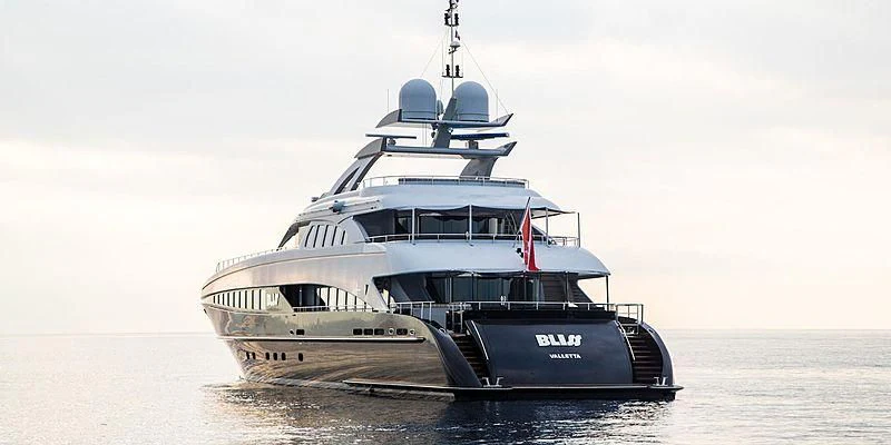 a large ship in the water aboard BLISS Yacht for Sale