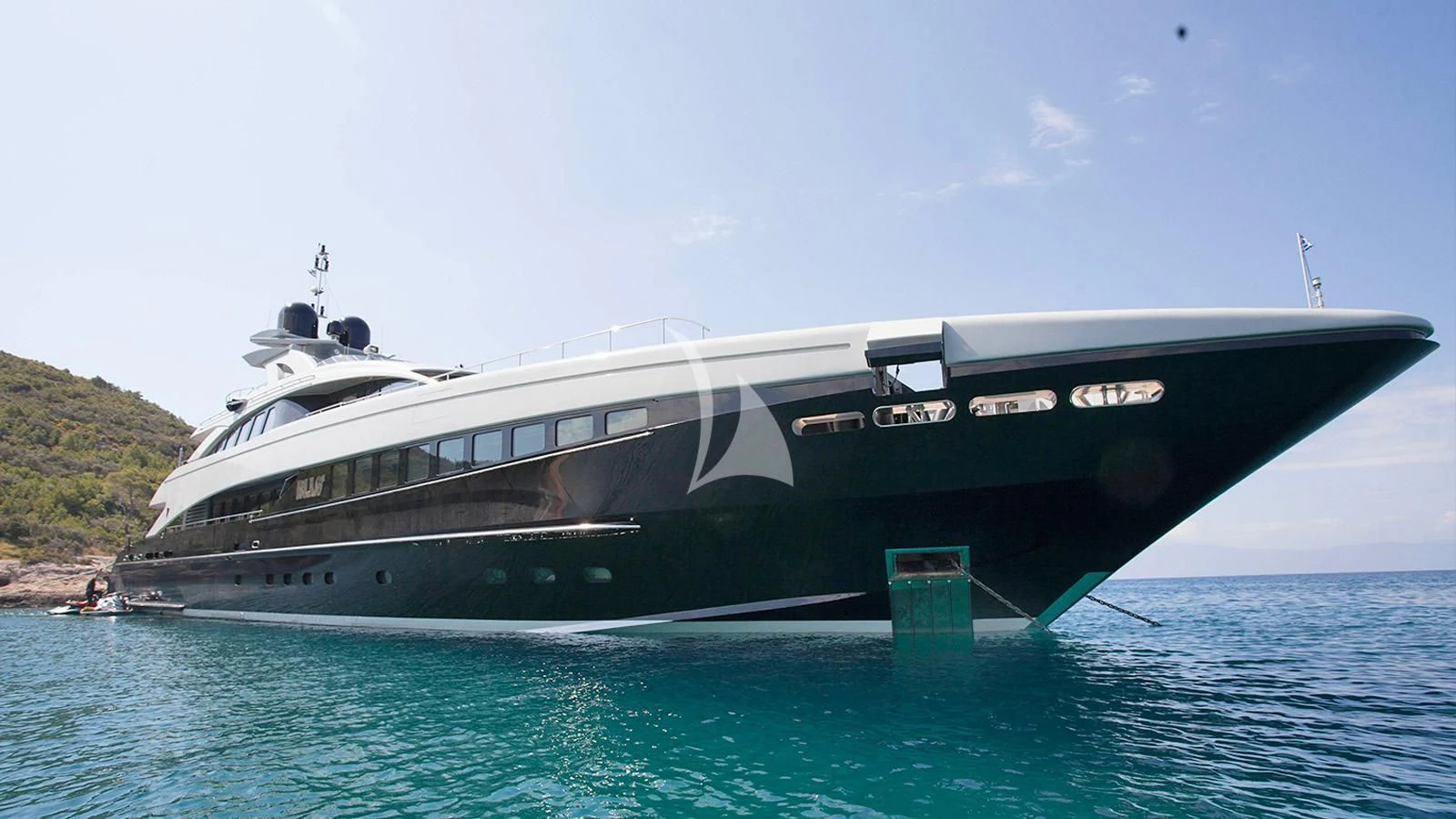 a large ship in the water aboard BLISS Yacht for Sale