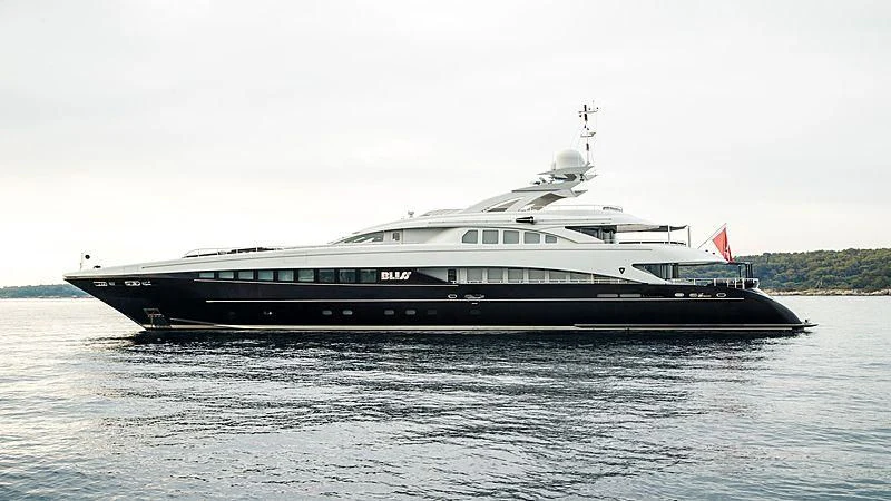 a large boat on the water aboard BLISS Yacht for Sale
