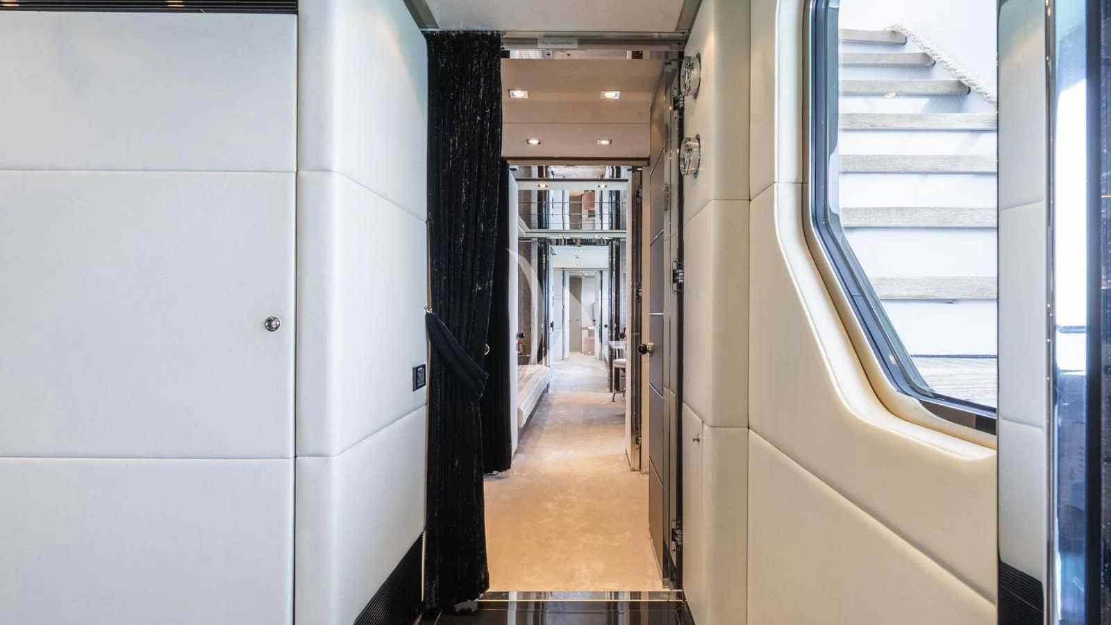 a hallway with doors aboard BLISS Yacht for Sale