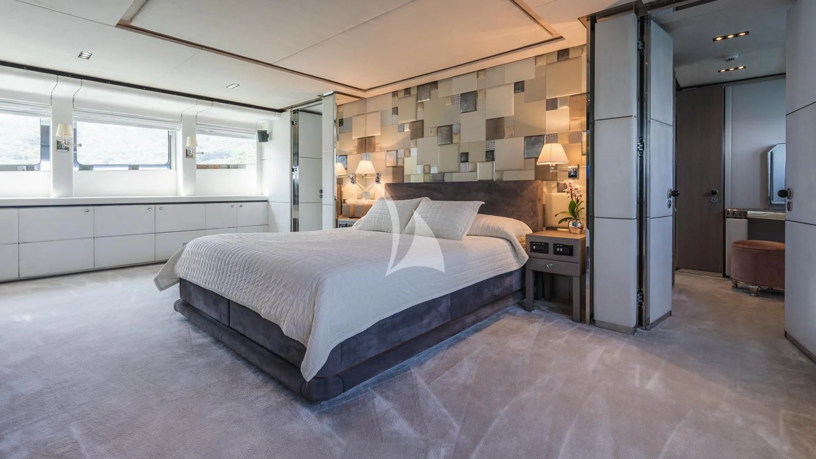 a large bed in a room aboard BLISS Yacht for Sale