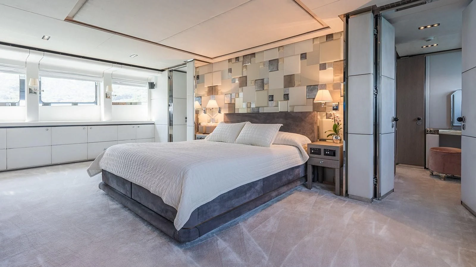 a large bedroom with a large bed aboard BLISS Yacht for Sale