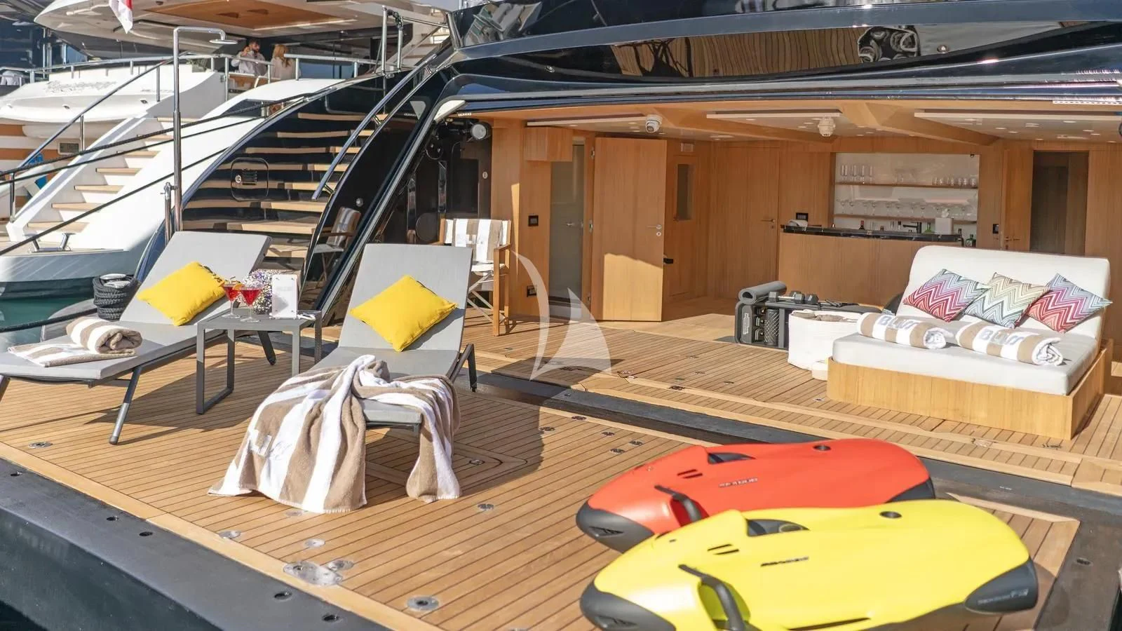 a room with a bed and a couch aboard BLISS Yacht for Sale