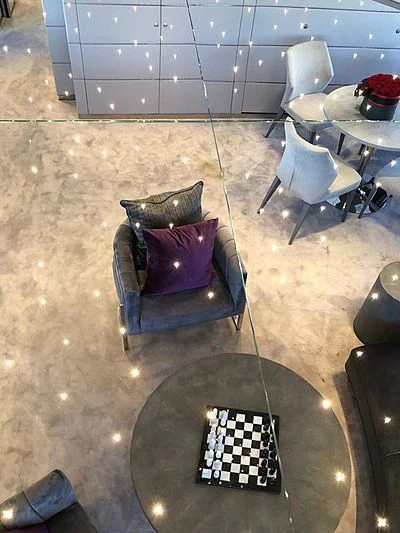 a room with chairs and a table aboard BLISS Yacht for Sale