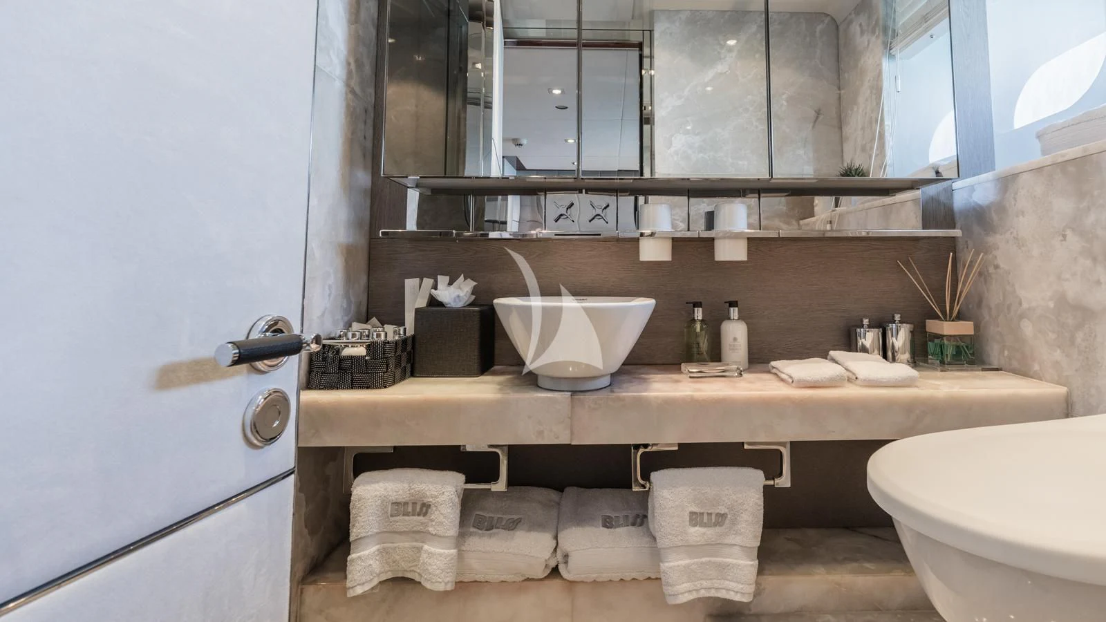 a bathroom with a sink and toilet aboard BLISS Yacht for Sale