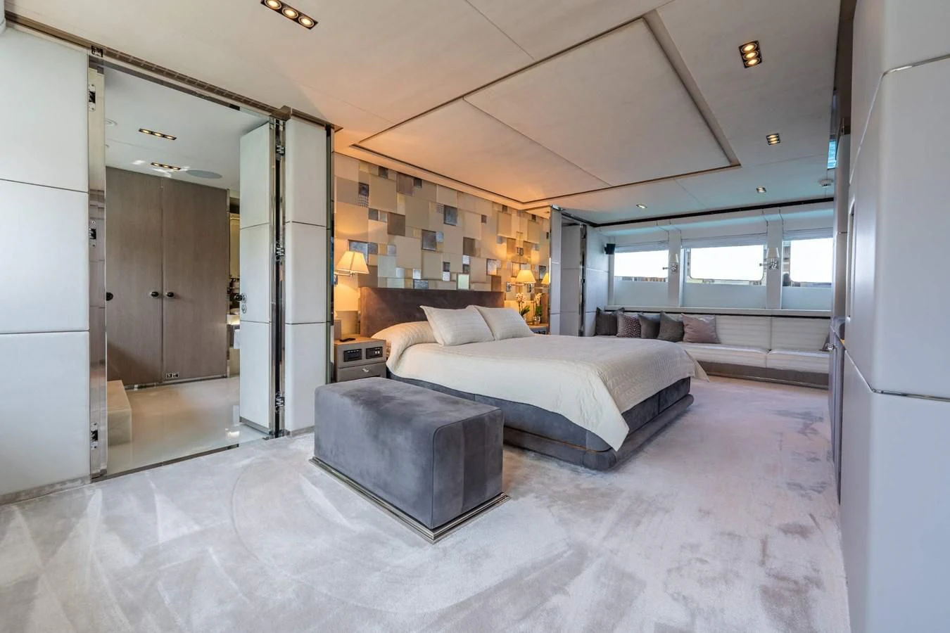 a large bedroom with a large bed aboard BLISS Yacht for Sale