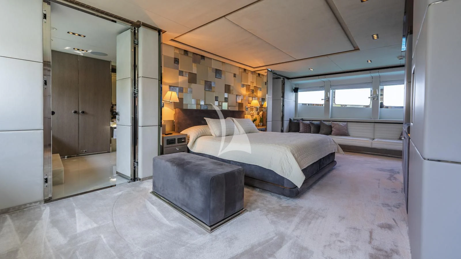 a large bedroom with a large bed aboard BLISS Yacht for Sale