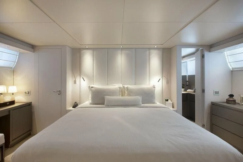 a large white bed in a hotel room aboard SANLORENZO SL82-570 Yacht for Sale