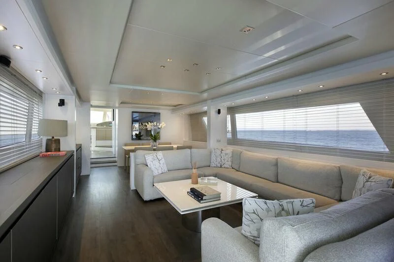a living room with a couch and a table aboard SANLORENZO SL82-570 Yacht for Sale