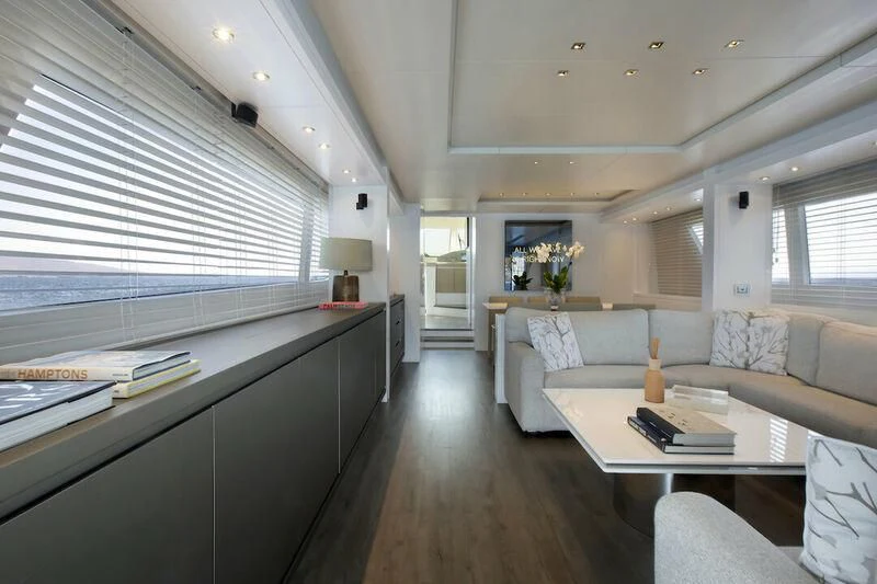 a living room with a couch and a table aboard SANLORENZO SL82-570 Yacht for Sale
